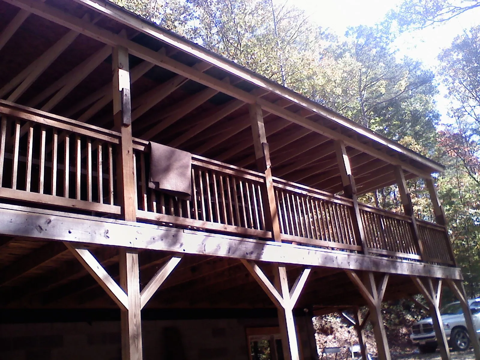 Timber framing under a new elevated porch and deck — Roof Leak Repair in Tioga by Roofing Brothers
